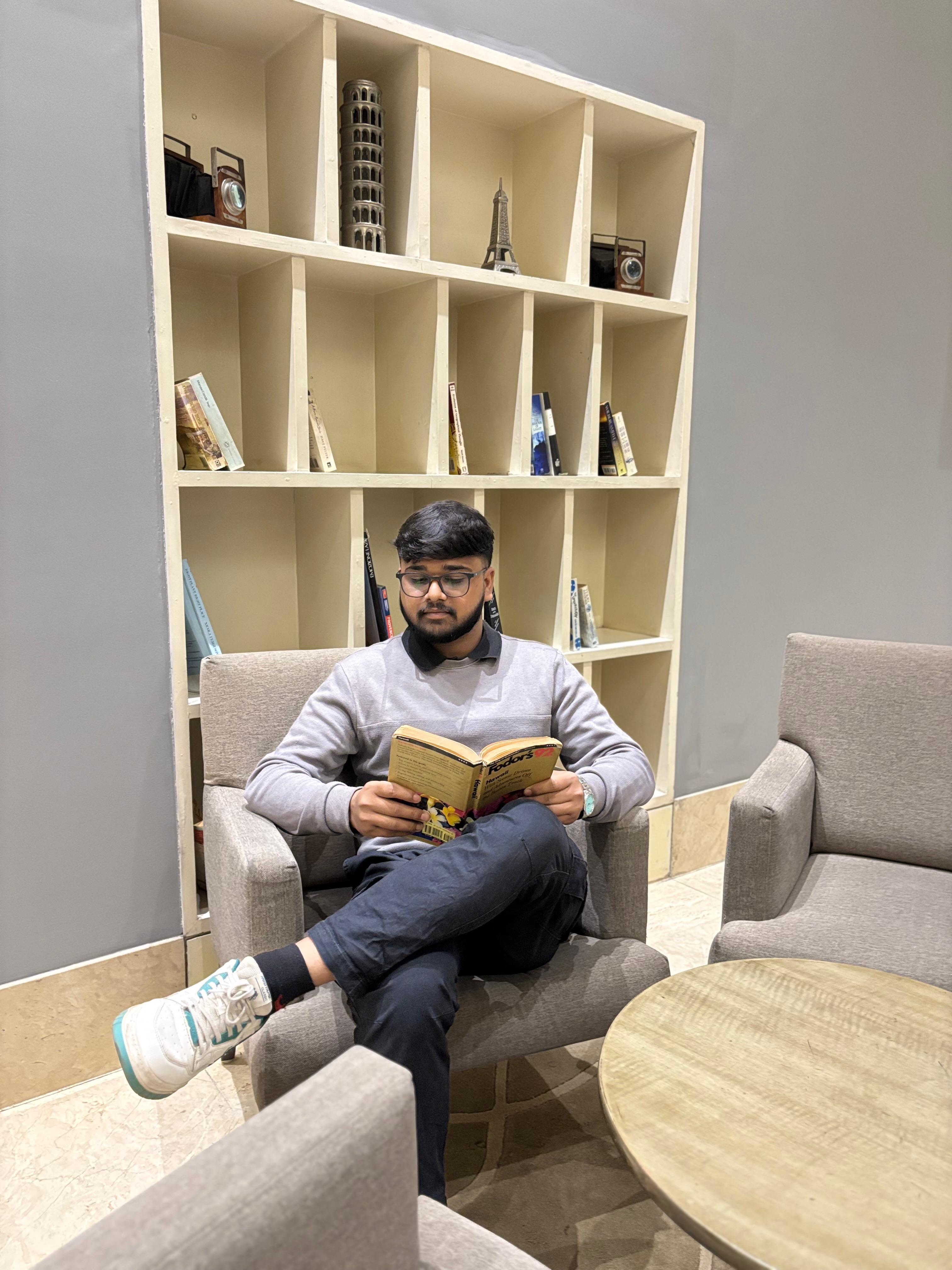 Anshul reading a book