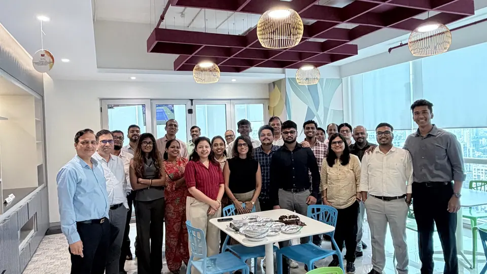 Group photo of the Hindalco team at a farewell gathering